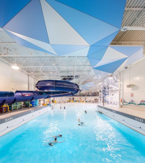 Dangerous things to let your children do - Swim. Picture of Calgary's Trico Centre Swimming Pool and Slide