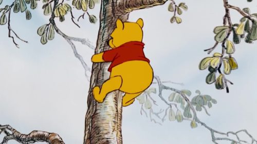 Picture of Winnie the Pooh climbing a tree